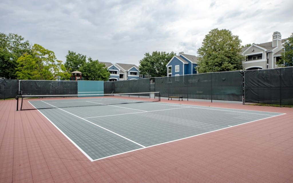 Join your neighbor for a game of tennis