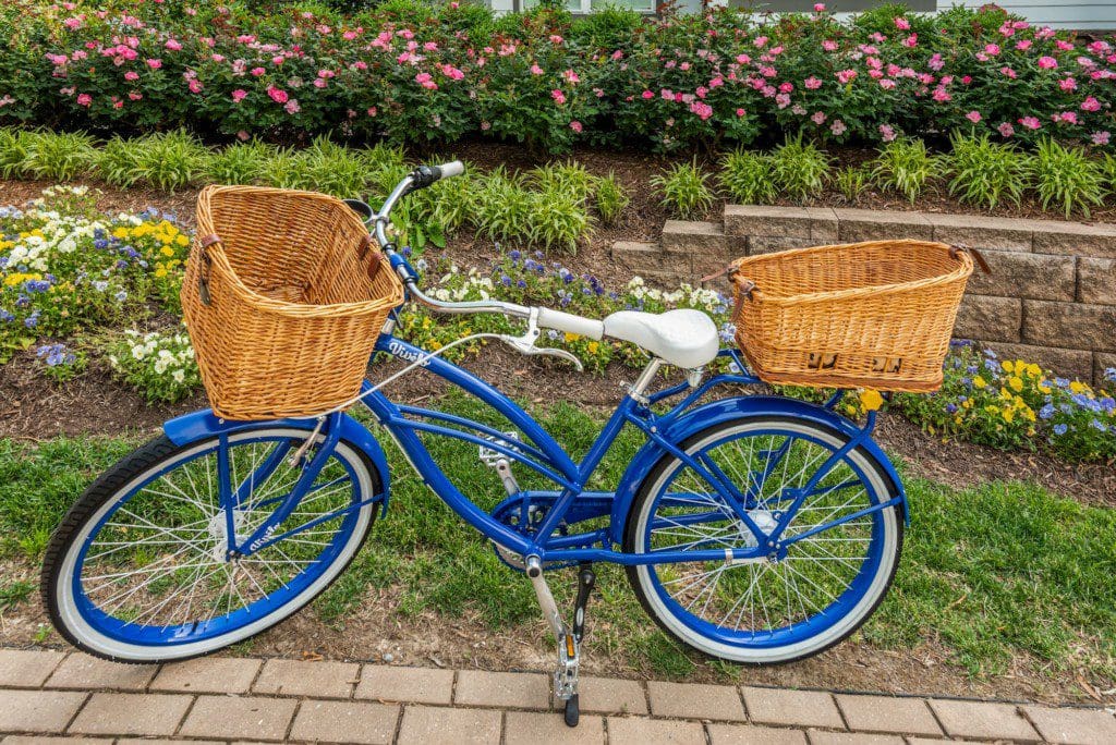 Blue Bicycle with Wicker Basket and White Wall Tires